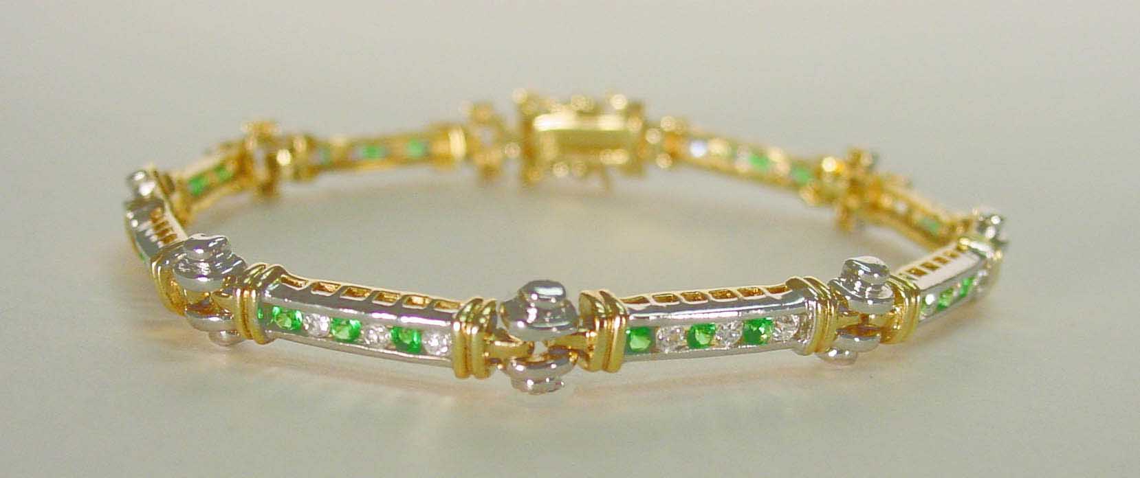 Emerald CZ & Clear CZ bracelet in channel setting