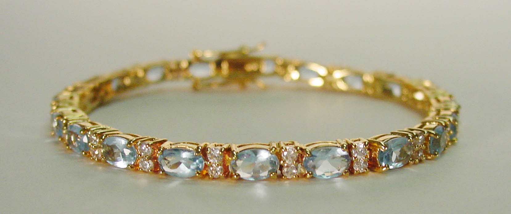 Blue topaz CZ & clear CZ gold bracelet