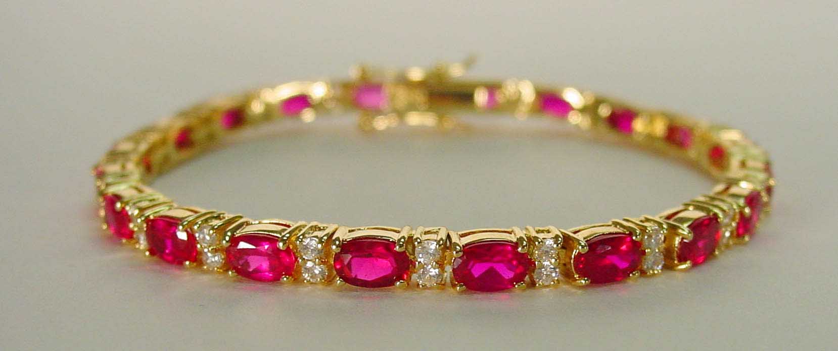 Ruby CZ & clear CZ gold bracelet