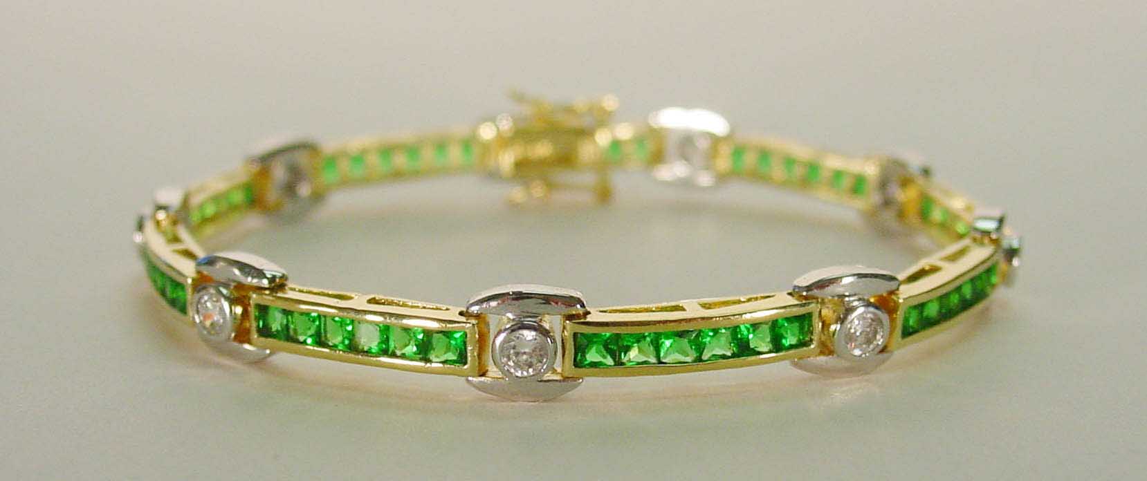 Emerald CZ & clear CZ two-tone bracelet