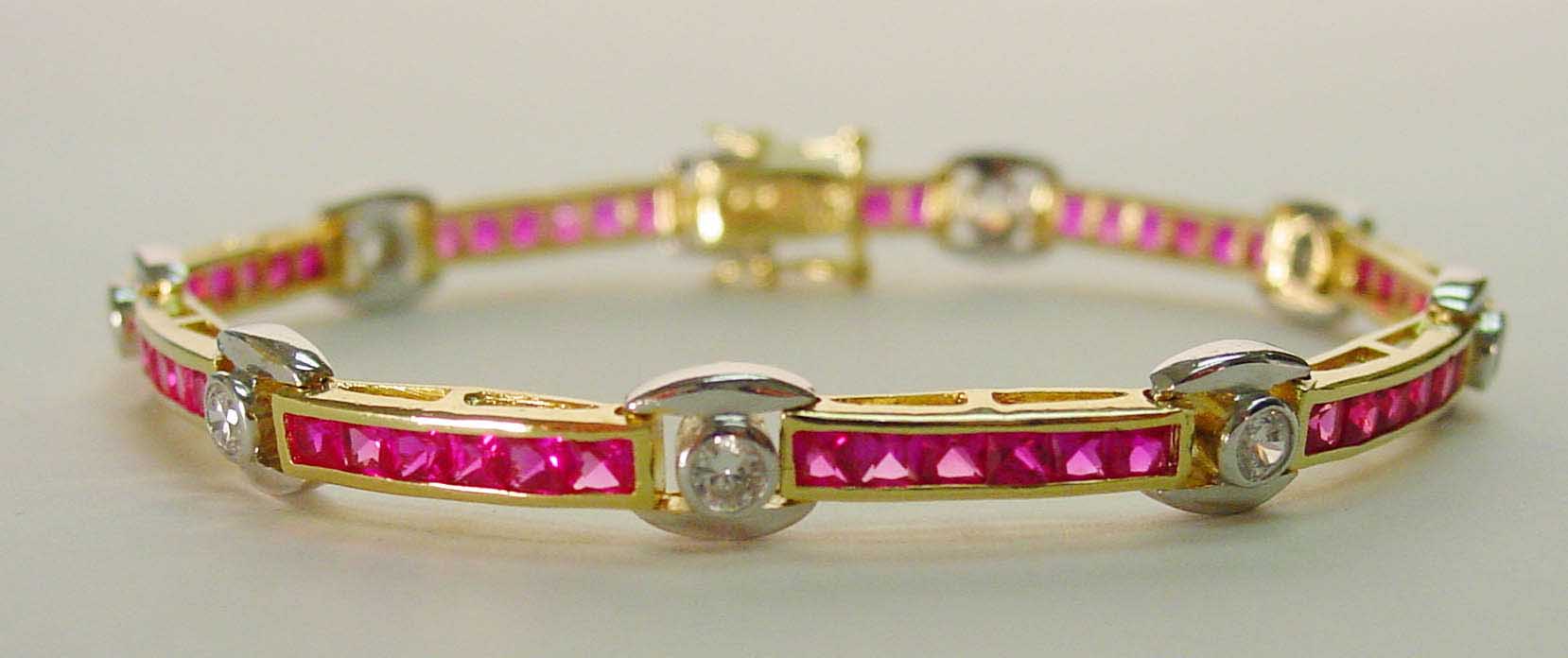 Ruby CZ & clear CZ two-tone bracelet