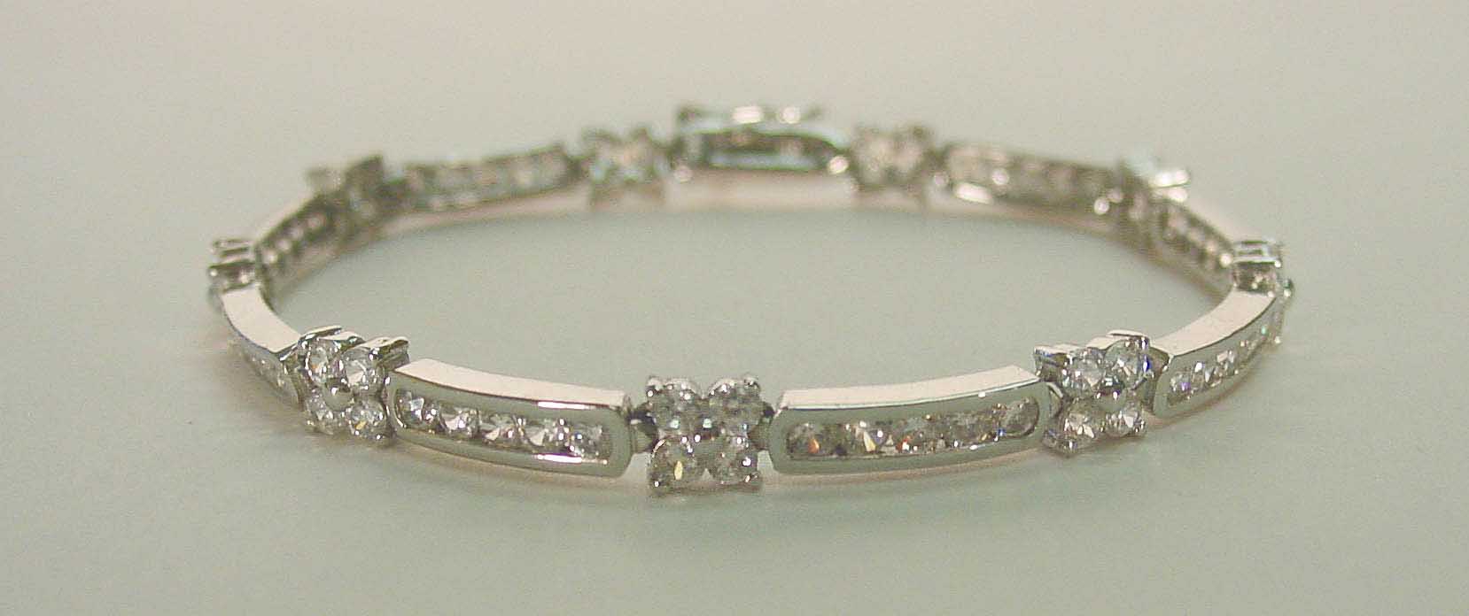 Clear CZ channel set flower silver bracelet