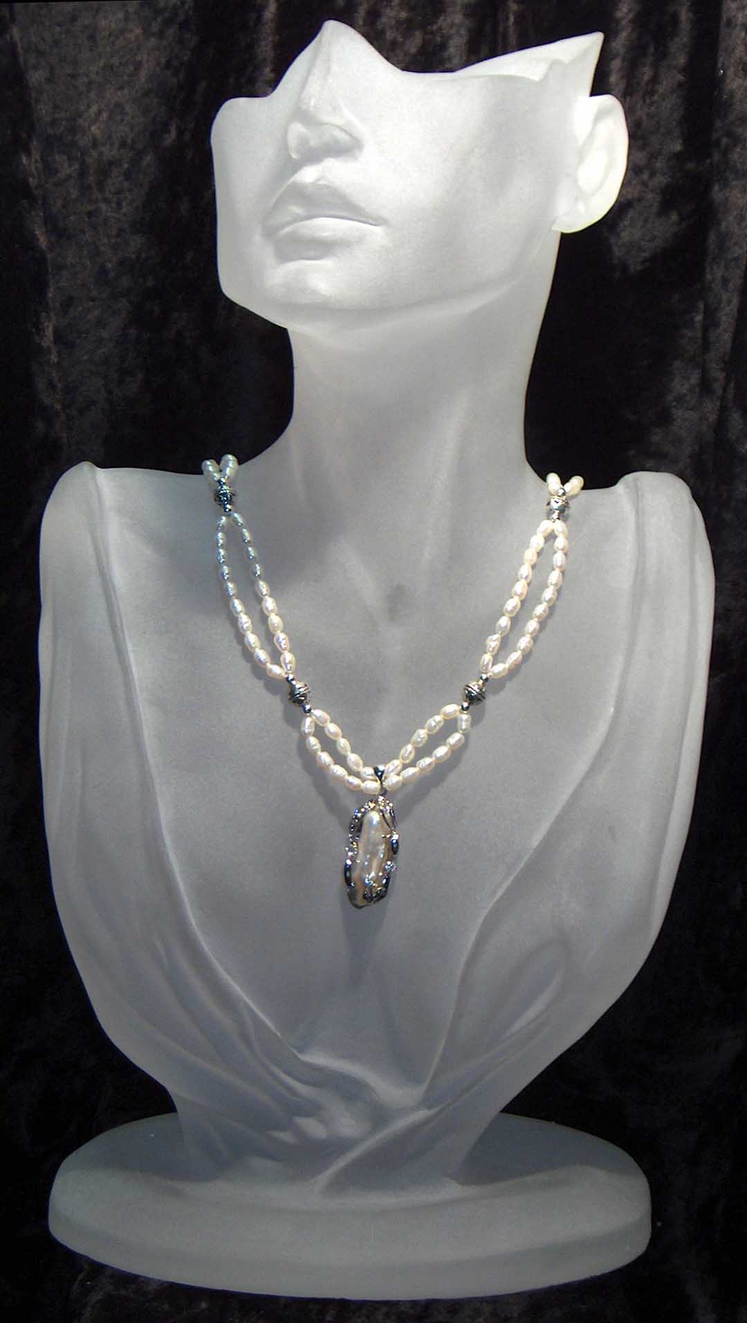 Fresh water pearl necklace with hanging silver pearl CZ pendant