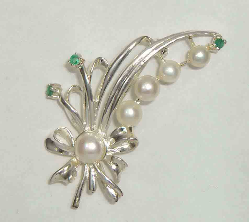 Fresh water pearl with emeralds set in sterling silver