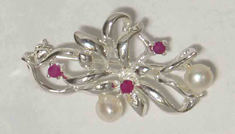 Fresh water pearl with rubies set in sterling silver
