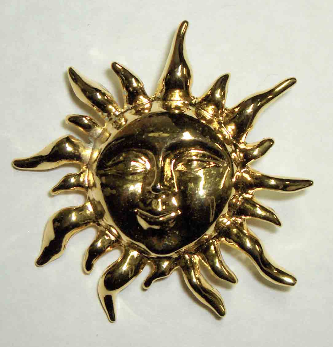 Gold sun pin