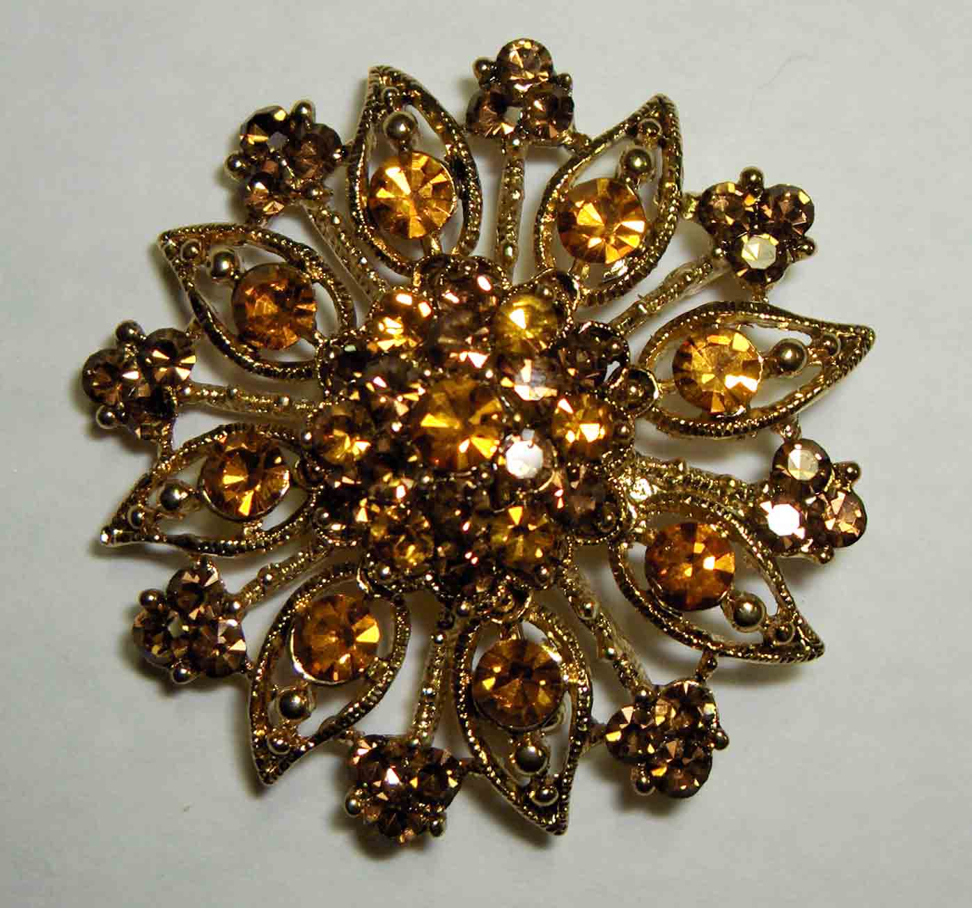 Topaz crystal flower pin