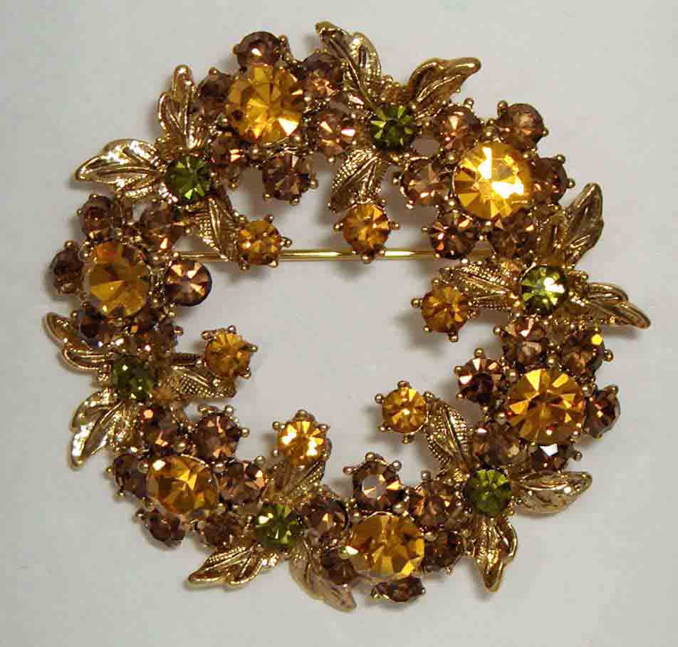 Topaz, green crystal wreath pin